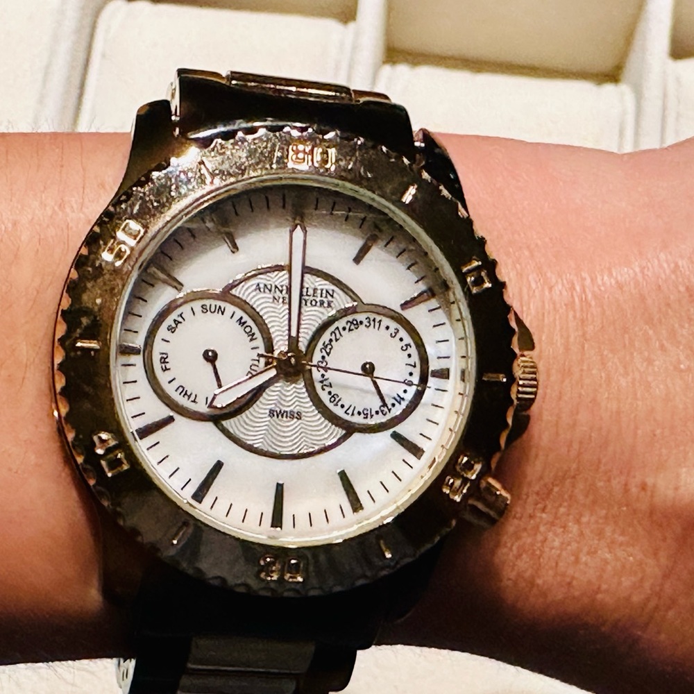 Anne Klein tortoise shell and gold accent watch.